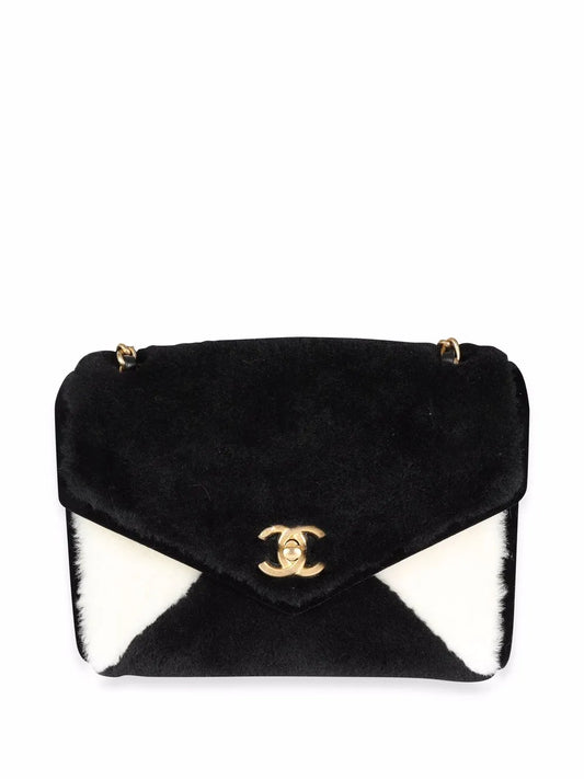 CHANEL CC Turn lock shearling shoulder bag