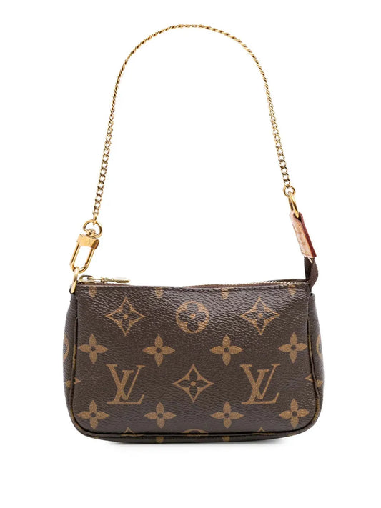 Louis Vuitton 2015 Monogram Mini Pochette Accessoires handbag